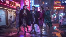 A centerpiece poster featuring the "Juliana Five" marching confidently through the glamorous, neon-lit streets of 1990s Seoul.