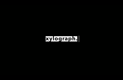 The name "Xylograph" originates from the art of engraving words or patterns on wood, symbolizing the company's belief in engraving meaningful stories onto the screen.