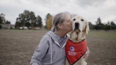 A main still from Long Live the Dog capturing a warm moment between a dog and its owner. Beyond canine health and longevity, the image reflects the documentary’s central message: what it means to live longer, healthier, and happier lives together with the dogs we love.