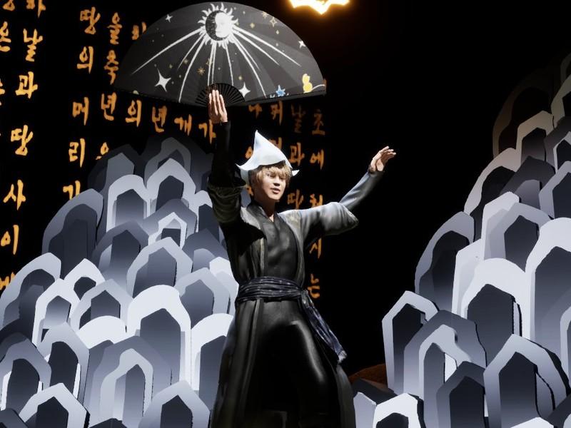A motion-captured Simbang character dances with a fan as Jeju Bonpuri (oral mythology) text flows across the metaverse performance scene